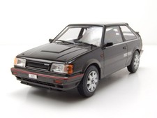 Mazda 323 4WD Turbo 1989 schwarz grau Modellauto 1:24 Whitebox