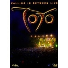 Toto falling between live - toto, live"
