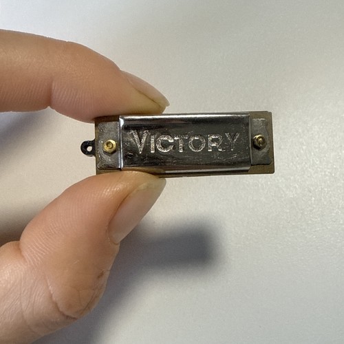 Vintage miniature harmonica