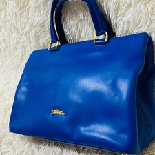 Longchamp Honore Handtasche aus Leder mit goldenen Beschlägen in blau gebraucht