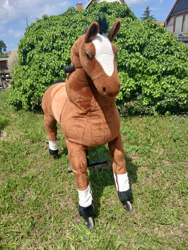 Reitpferd auf rollen - auf, aus