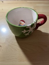 Kleine Tasse mit Figur