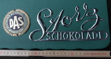 Kein Emailschild , Blechschild, DAS Plakette, Storz Schokolade alte Reklame 