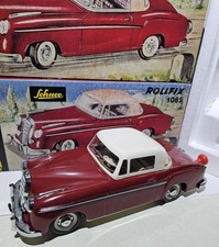 Schuco ROLLFIX 1085 MERCEDES BENZ 220SE PONTON COUPE 1960 REPLICA OVP ROT