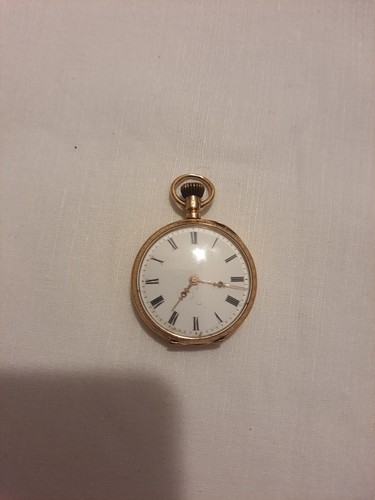 Kleine goldene taschenuhr - k,