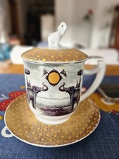 Teetasse mit Siebeinsatz und Deckel