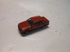 Rar: Opel Corsa A TR Stufenheck braunrot von Herpa in 1:87