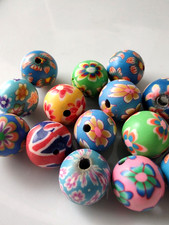 15 Fimo-Perlen "Blumen"