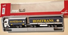 Herpa 156653 MAN TGX XXL Gardinenplanen-Eurocombi "Homtrans"