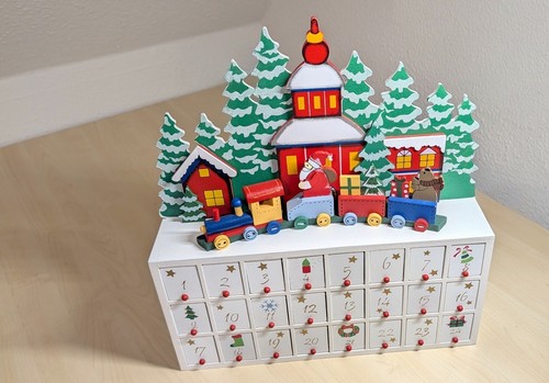 Adventskalender aus holz - adventskalender, ein