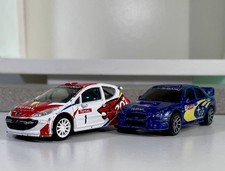 Peugeot 205 Subaru Impreza