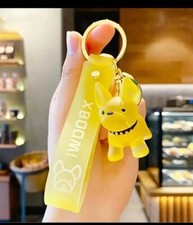 Schlüsselanhänger mit französischer Bulldogge. (Gelb) 