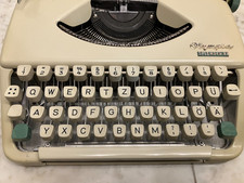 Olympia Splendid 33, sehr guter Zustand mit Koffer, Lehrbuch von 1953