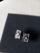 2 Manschettenhalter -knöpfe