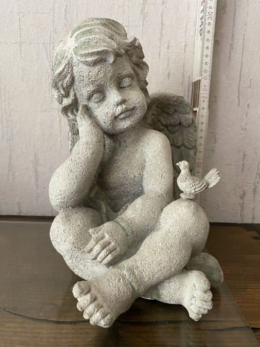 Engel putte sitzend mit - engel,