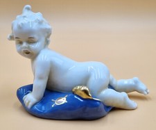 Seltene Porzellanfigur E. & A