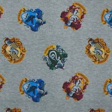 Jersey Stoff Harry Potter, Wappen, meliert, grau (Meterware ab 0,50m)