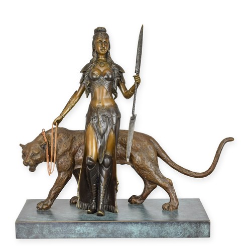 Eine bronzeskulptur einer frau - eine,