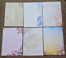 12 Blatt Briefpapier mit verschiedenen Motiven und 1 passender Umschlag