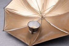 1 Multiblitz – Blitzschirm gold mit Reflektor