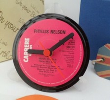 PHYLLIS NELSON CLOCK Side