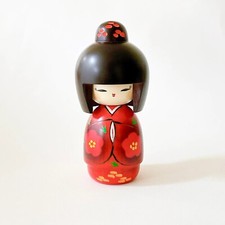 Kokeshi "hohoemi" -