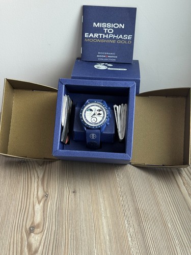 Swatch omega mission the - mission,
