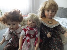 Porzellanpuppen 3 Stück eine mit Spieluhr beweglich