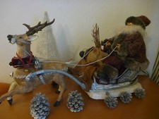 Weihnachtsmann auf Schlitten mit Rentier, mit Sound und Bewegung, Weihnachtsdeko