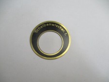 Nameplate switch windshield