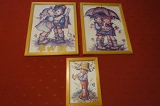 3 gerahmte Bilder im