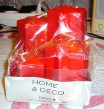 4 rote sternförmige Gesteck