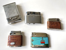 8) 5 alte Benzinfeuerzeuge mit