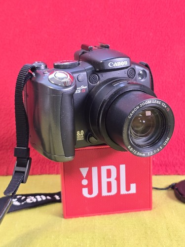Canon powershot is - s5,