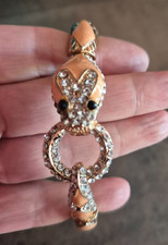 Elegantes Armband mit Glitzersteinchen in Schlangenmotiv