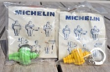 2 alte MICHELIN BIBENDUM Schlüsselanhänger, original Puzzle gelb / Werbefiguren
