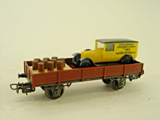 Niederbordwagen m. Schrottauto