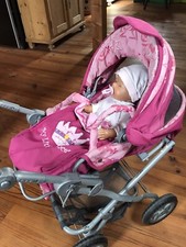 Puppenwagen - Set mit BabyBorn-Puppe, Maxi Cosi und viel Puppenkleidung