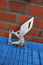 Honda CBR 125 R  JC50  Fußrastenhalter vorne links original 2011-2016