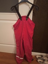 Gefütterte Matschhose in neutralem Rot von CareTec, Gr. 116 - SEHR GUT!