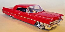 Jada Toys No.99552 1963er Cadillac Coupe Series 62,gepimptes Modellauto 1:24 Top
