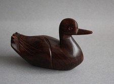 Kleine Holz Figur Ente aus