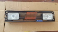 Fiat Uno Hörmann Hella Zusatzscheinwerfer Frontgrill NOS komplett 