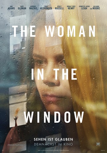 The woman - in, window