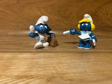 2x frühe Vintage Schlümpfe Peyo. Schlumpf Krankenschwester. Schlumpf Erste Hilfe. 1981,1979.