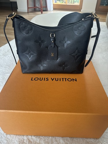 Louis vuitton carryall - louis, pm