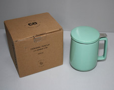 Teetasse mit Sieb und Deckel