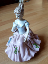 Deko- Porzellanfigur -Spieluhr