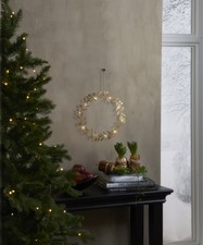 Leuchtender Gold Metallkranz