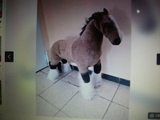 Spielzeug Pferd zum Reiten